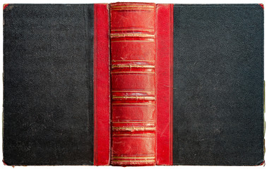 Wall Mural - Old open book cover with black textured paper boards and cracked embossed red leather spine with abstract golden geometric decorations - circa 1864 - isolated on white