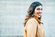 © Inti St. Clair - Side profile of smiling woman
