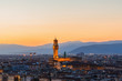 Sunset over the city of Florence with Palazzo Vecchio