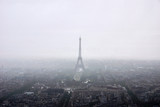 Fototapeta Paryż - Panoramic view of Paris with eiffel tower in fog