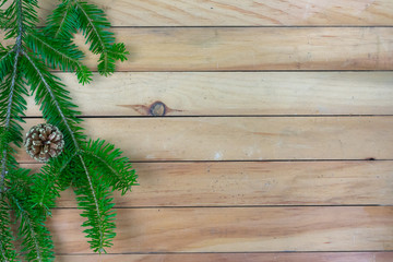 Greenery and pine cone left side border with copy space