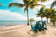 © Ryan Longnecker - Two empty beach chairs on a sunny day at the beach