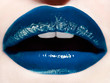 © Lindsay Adler - Close up of lips with blue lipstick