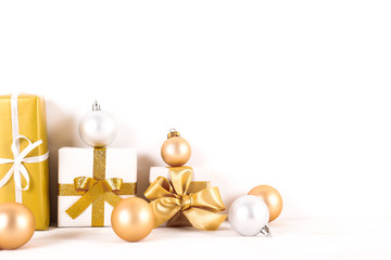 Minimalistic festive composition with wrapped presents, colorful matte christmas balls. Fancy beautiful decoration for christmas pine tree. Background, copy space, close up, front view.