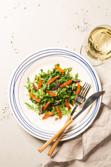 Wall Mural - Salad with arugula (rucola) and caramelised carrot