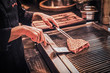 Close-up image of a cooking delicious meat steak on a grill