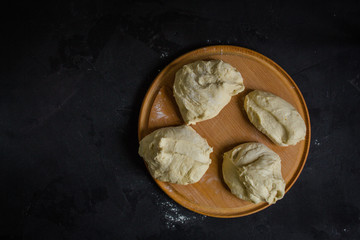 Wall Mural - pizza - dough, preparation, flat cake (the process of cooking). Top view with copy space