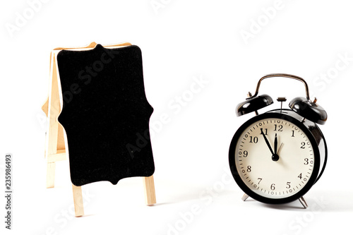 Empty Menu Board And Black Vintage Clock Isolated On White
