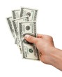 © BillionPhotos.com - Hand Holding Money
