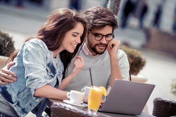 Sticker - Young couple in love sitting in cafe