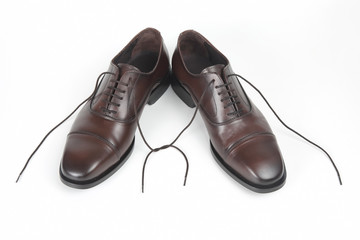 Classic men's brown shoes on white background