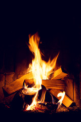 Fire in an old home fireplace.