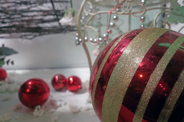 Wall Mural - red christmas balls lying in the snow