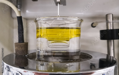 Interfacial tension between two immiscible liquids