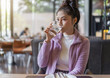 © geargodz - woman drinking a glass of water in restaurant