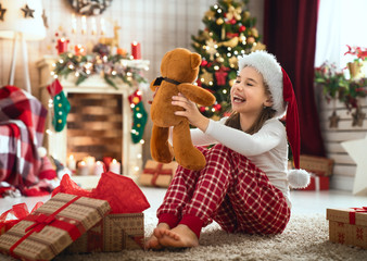 girls opening Christmas gifts