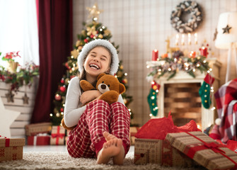 girls opening christmas gifts