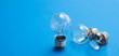 © stenkovlad - Idea concept with light bulbs on a blue background