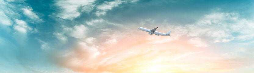 airplane flying in the blue sky,panoramic view