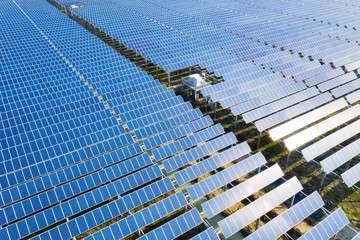 Poster - aerial view of blue solar panels