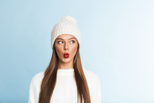 Pretty Young Woman Wearing Sweater And Hat