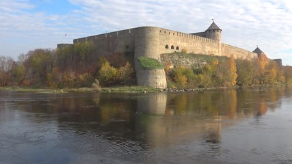 Wall Mural - Ivangorod fortress on the river Narva, autumn. Ivangorod, Russia 