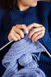 © FOLIO - Young woman knitting in Sweden