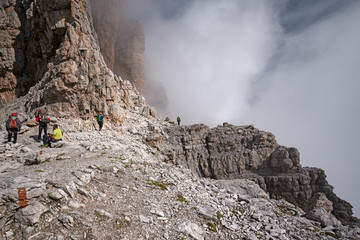 Wall Mural - mountaineers equipped face the 