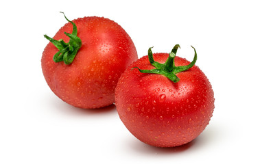 Tomatoes isolated on white background. Two fresh raw vegetables