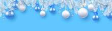 Blue Christmas And New Year Banner With White Fir Branches And Christmas Balls.