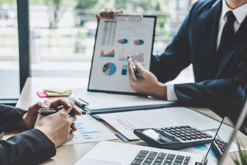 Fototapete - Two executive discussing company growth project success financial statistics, Partner meeting professional investor working start up project for both company with document, laptop and digital tablet
