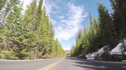 Fotomurali - Driving on paved road in Rocky Mountain National Park.