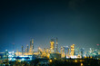 © weerapong - Glitter lighting of petrochemical industry estate with night