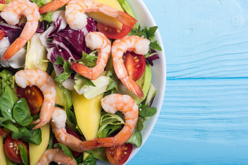 Poster - Mix of salad with shrimps , avocado and cherry tomatoes . Healthy food background