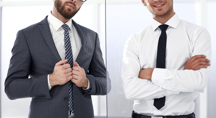 two business people standing in the office