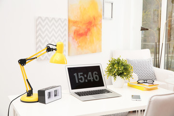 Poster - Stylish workplace with laptop on table in room