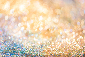 glitter gold bokeh Colorfull Blurred abstract background for birthday, anniversary, wedding, new year eve or Christmas