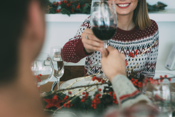 Wall Mural - Young woman and man celebrating Christmas