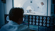 © Gorodenkoff - In Medical Laboratory Patient Undergoes MRI or CT Scan Process under Supervision of Radiologist, in Control Room Doctor Watches Procedure and Monitors Brain Activity.