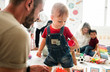 © Rawpixel.com - Cute little boy playing with toys at the learning center
