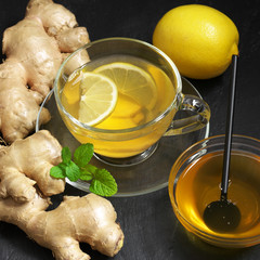 Poster - Ginger tea with lemon in glass cup