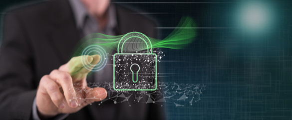 man touching a digital security concept