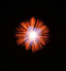 Golden orange amazing fireworks isolated in dark background close up with the place for text, Malta fireworks festival, 4 of July, Independence day, New Year, explode