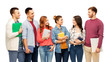 © Syda Productions - education, high school and people concept - group of smiling students talking over white background
