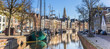 Panorama of historic ships and warehouses in the center of Groningen, The Netherlands