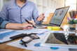 © Ngampol - Professional Business casual partner discussing ideas plan and presentation project at meeting working and analysis at workspace office, financial and investment concept
