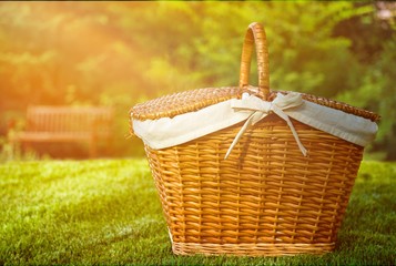 Wall Mural - Picnic Basket with napkin on nature background