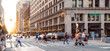 New York City street scene with crowds of people walking in Midtown Manhattan