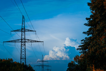 electricity pylons at sunset