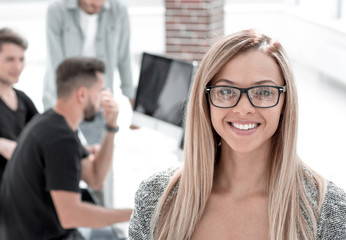 portrait of a girl.Business people working in modern office.